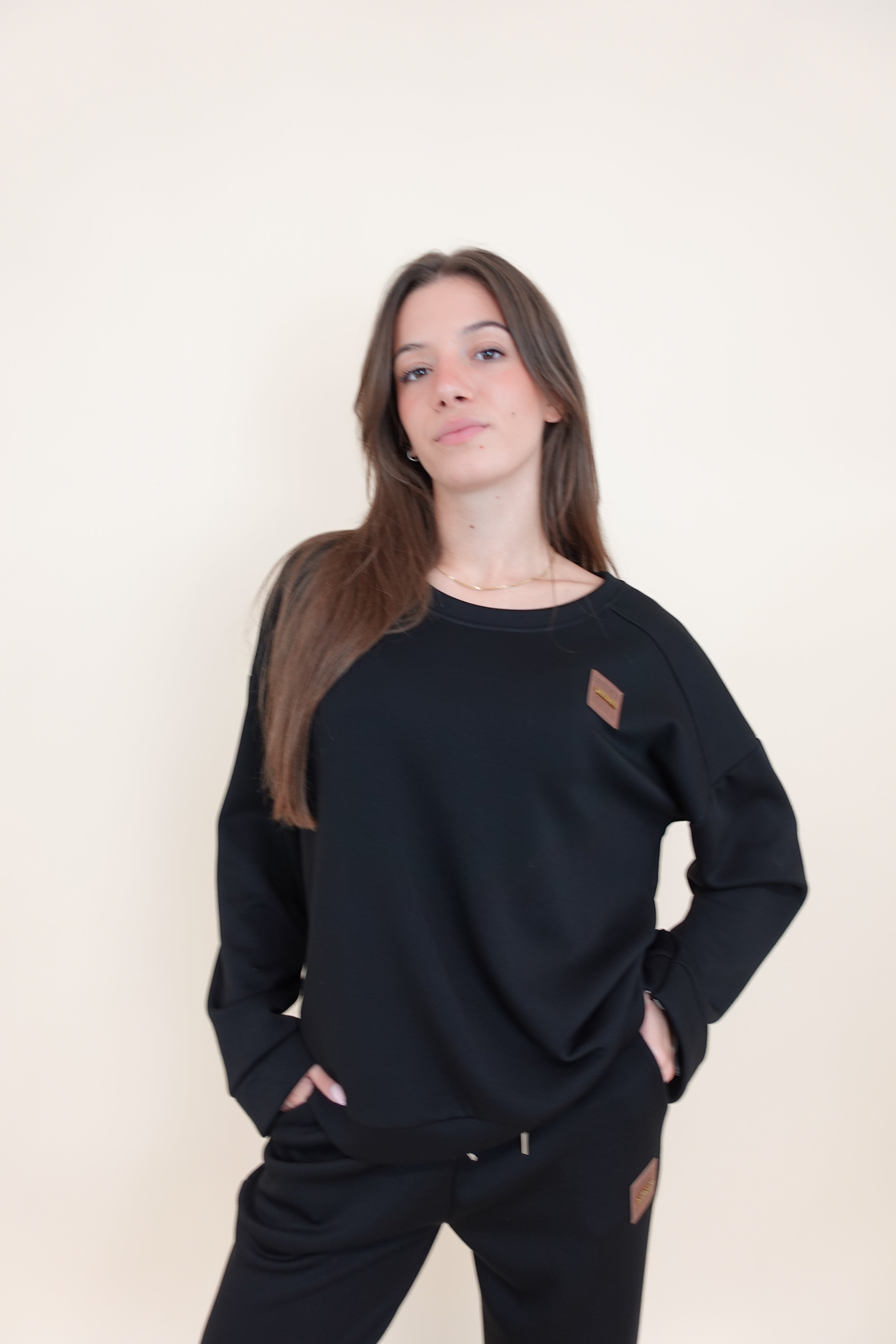 Tuta Aurora black