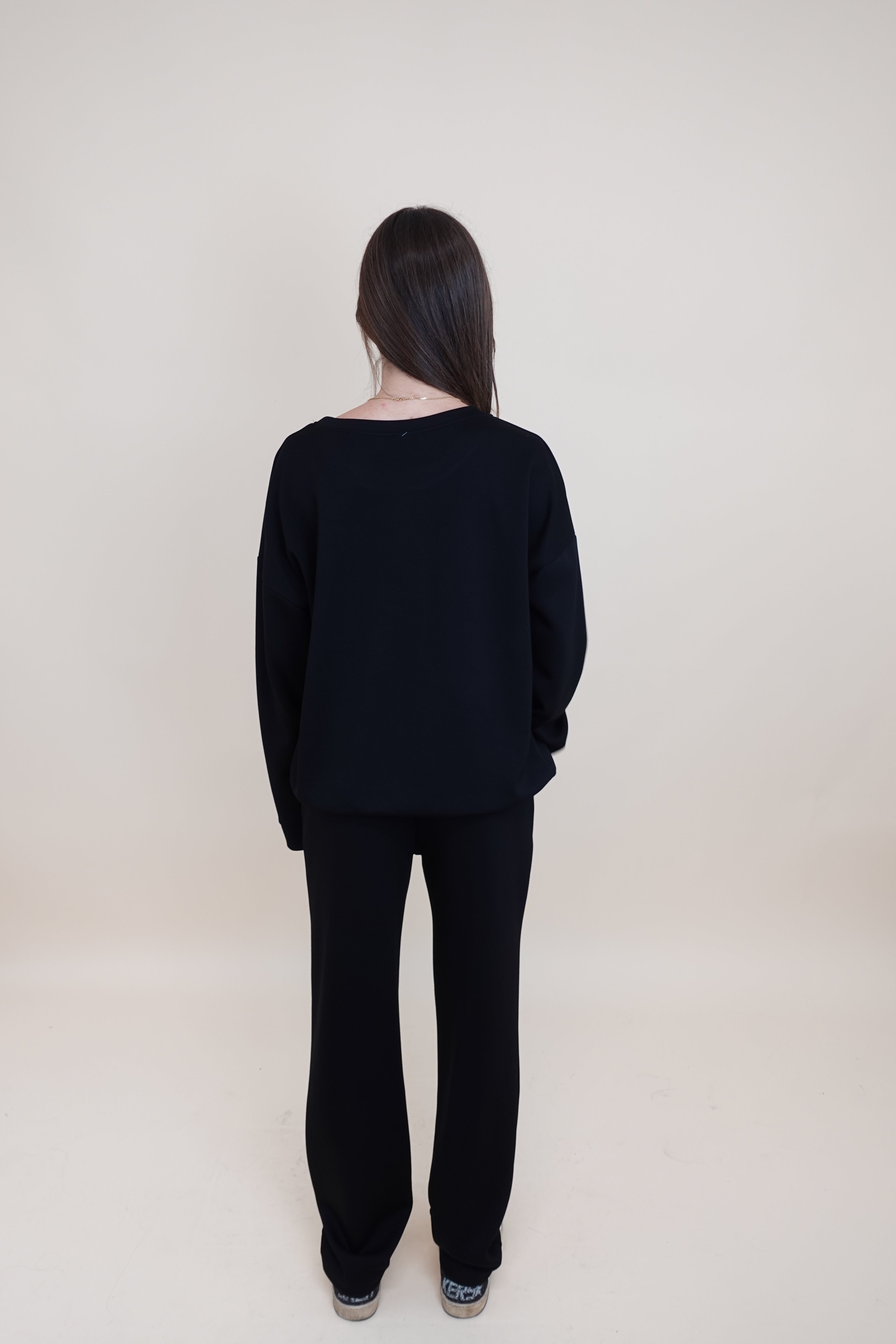 Tuta Aurora black