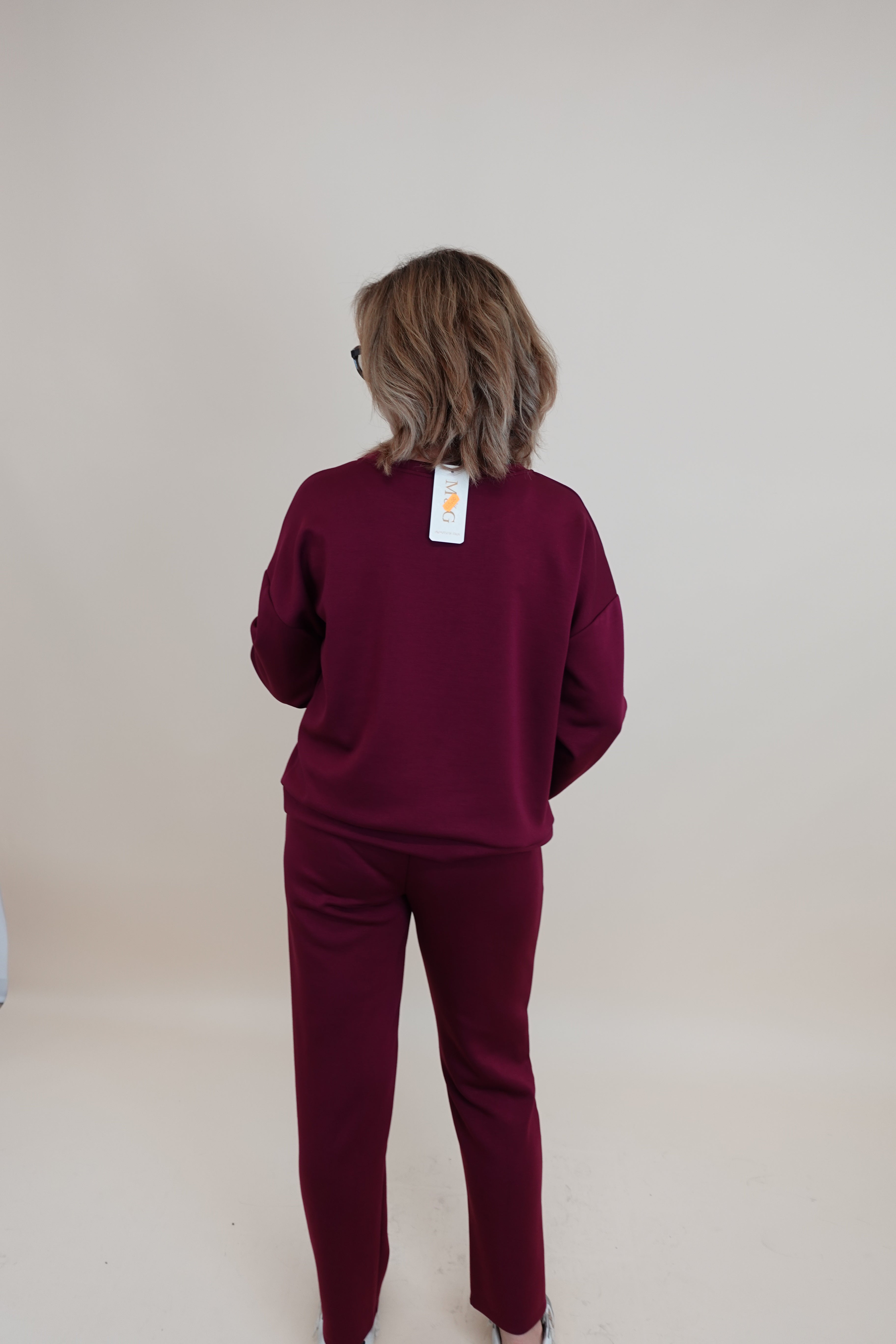 Tuta aurora bordeaux