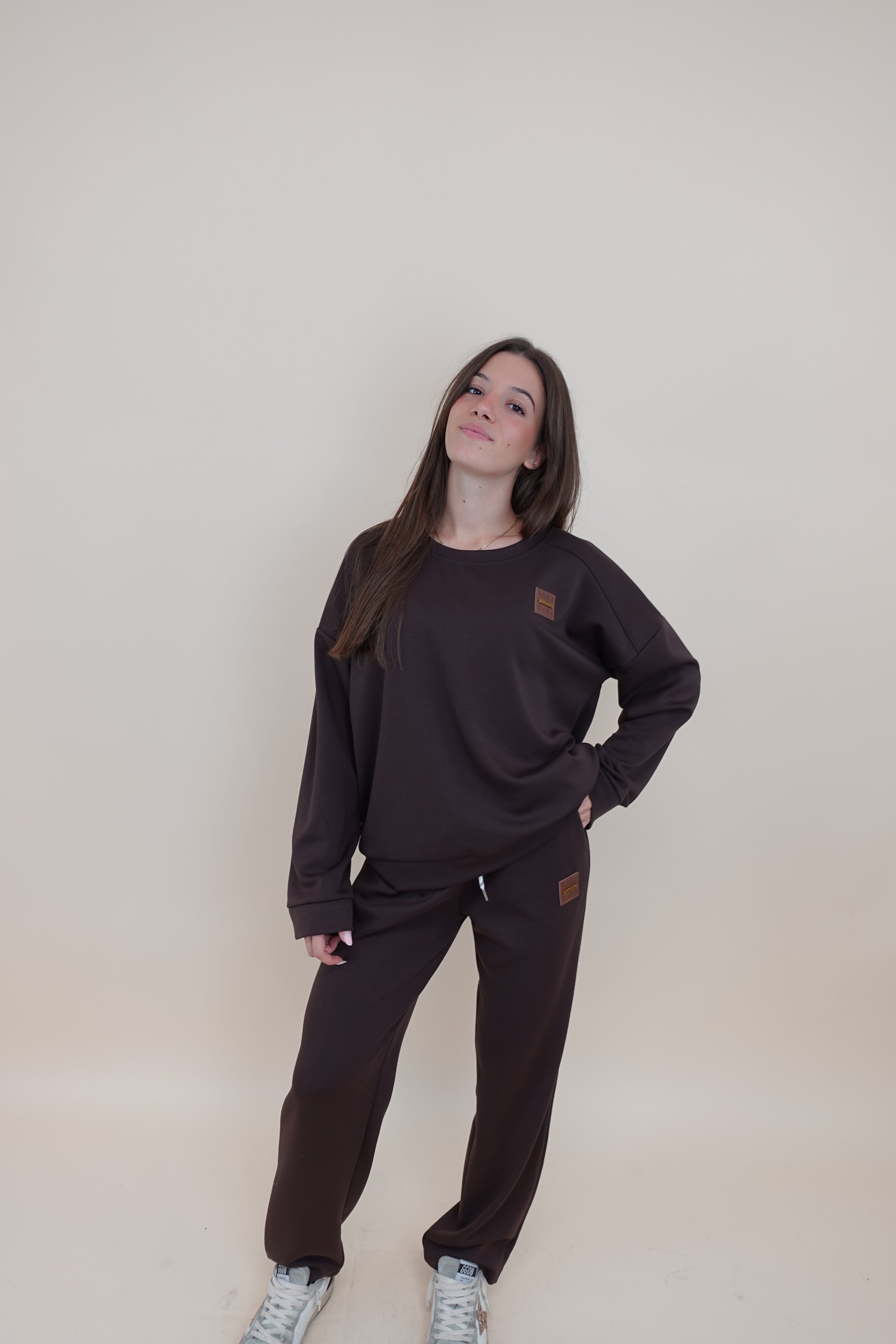 Tuta aurora marrone